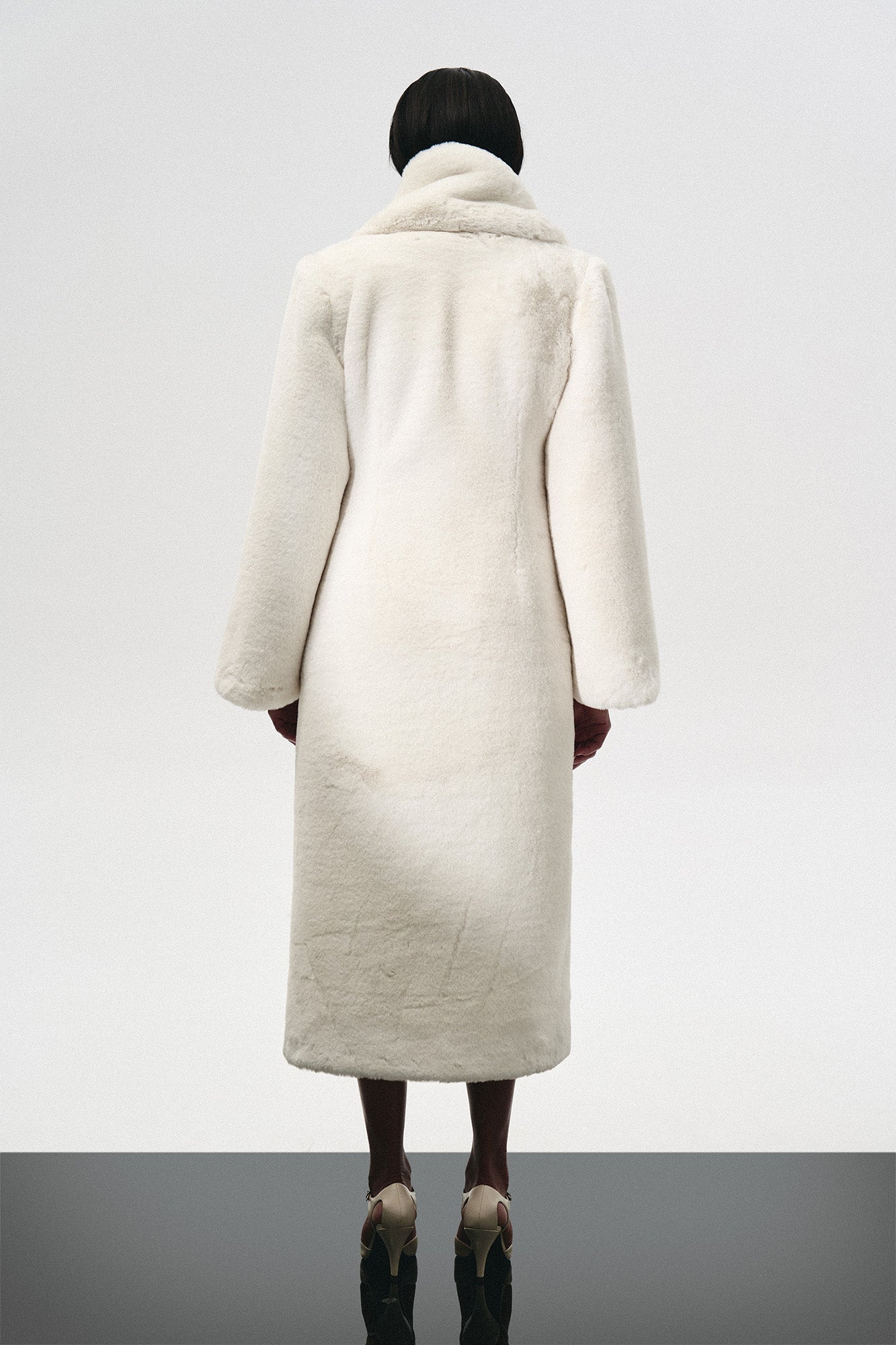 FUR MAXI COAT WITH SIGNATURE BUTTON