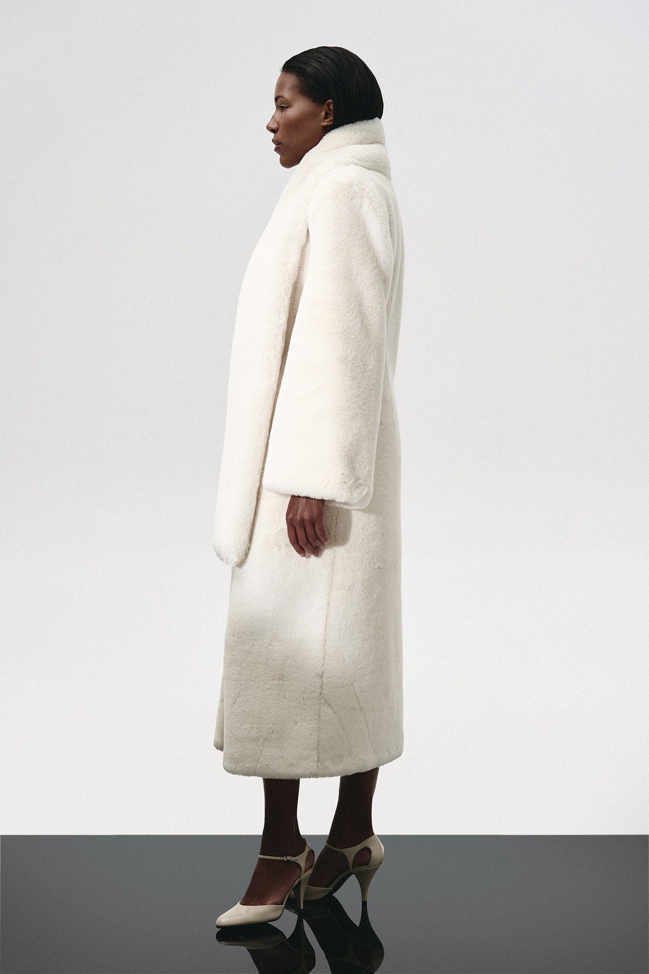 FUR MAXI COAT WITH SIGNATURE BUTTON