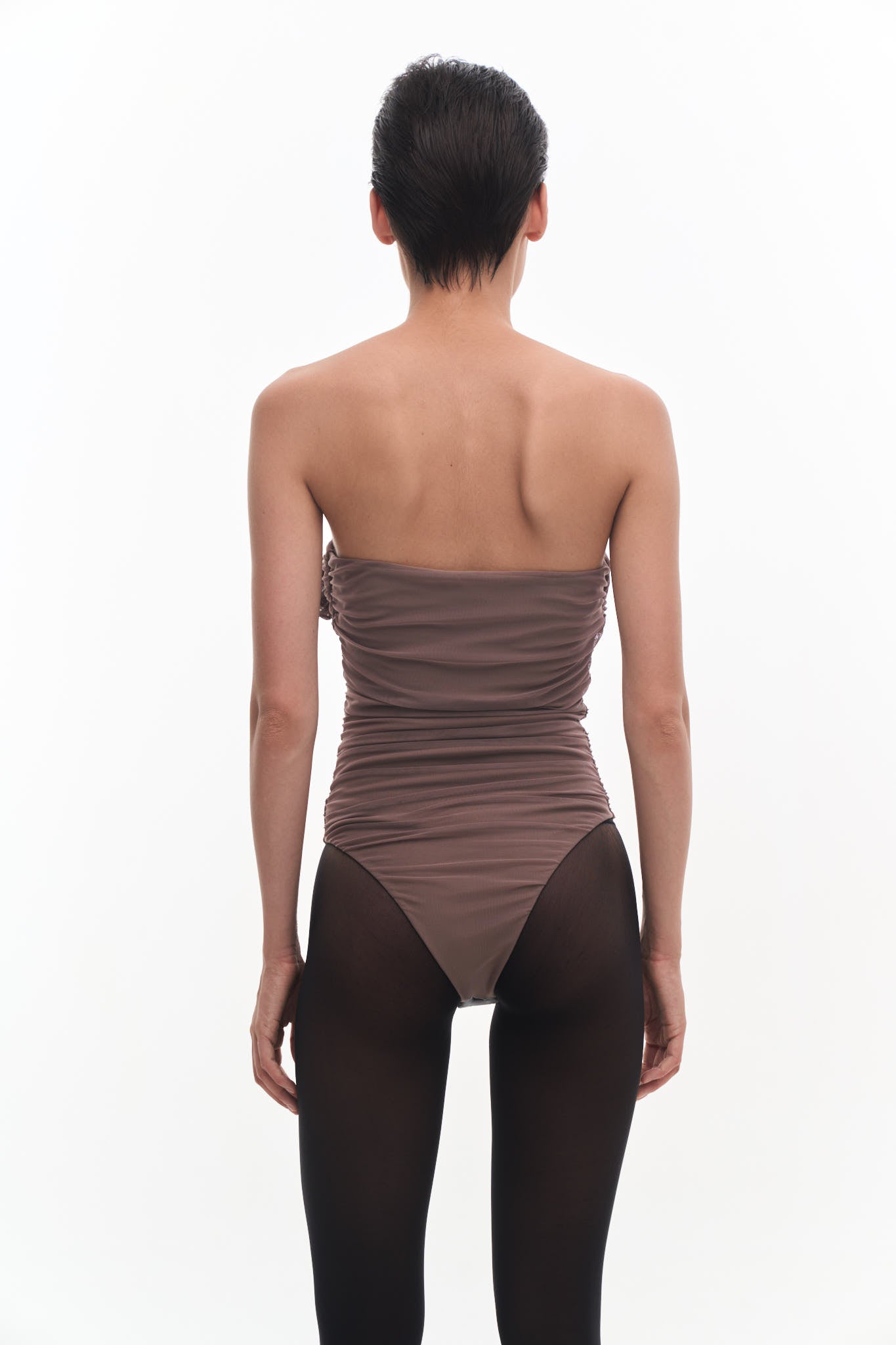 DRAPED BUSTIER BODYSUIT WITH A FLOWER